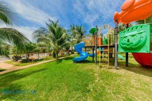 een speeltuin met een glijbaan in een park bij Ocean Vista - Sea Links Beach Hotel - by Bay Luxury in Ấp Phú Tịnh (2)