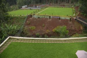 an aerial view of a garden with green grass at SpringWells Hotel ltd in Maua