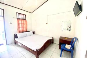 Кровать или кровати в номере SPOT ON 93562 Hotel Kenanga 1