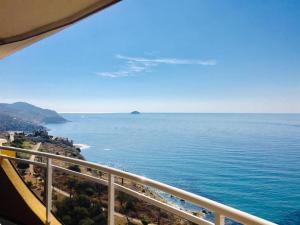 a view of the ocean from a balcony at TERRAMAR in Villajoyosa