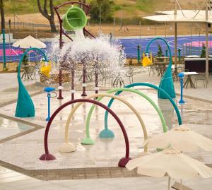 a water park with a water park at Trypiti Resort Blue Dream Palace and Hive Water Park in Limenaria