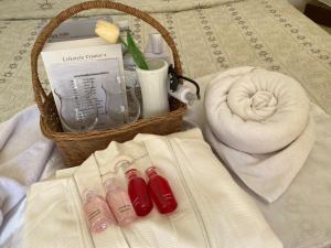a basket with a towel and a towel at Tid Khao Glamping & Bar in Tha Kradan