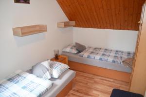 Ліжко або ліжка в номері Chata Zofka