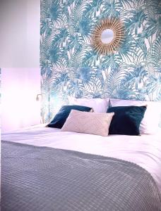Katil atau katil-katil dalam bilik di Le Tropic-Elegant appart lumineux et central