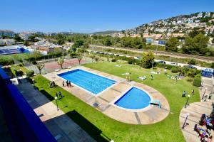 The swimming pool at or close to Marina Duplex by Hello Homes Sitges