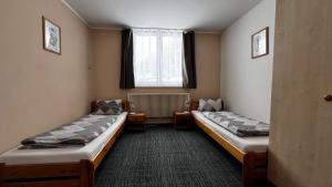 Postel nebo postele na pokoji v ubytování Apartman na Kvilde - Sumava