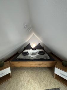 Postel nebo postele na pokoji v ubytování Ferienwohnung „Ruppbergblick“