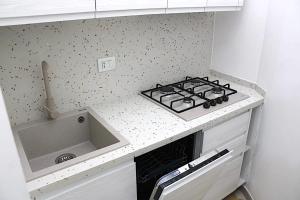 A kitchen or kitchenette at Li Frati Casa Vacanze