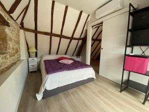 Ένα ή περισσότερα κρεβάτια σε δωμάτιο στο La Grange de Camille +3 φωτογραφίες