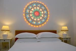 A bed or beds in a room at Li Frati Casa Vacanze