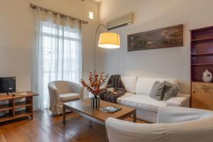 Una televisión o centro de entretenimiento en Únika Homes Porvenir