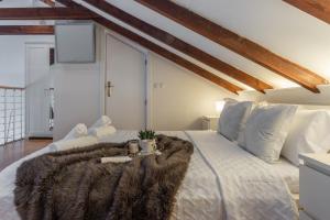 Cama o camas de una habitación en Únika Homes Porvenir