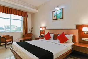 Cama ou camas em um quarto em Hotel Royal Empire