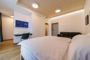 Postel nebo postele na pokoji v ubytování WUD hotel
