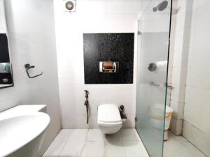 Koupelna v ubytování Hotel Delhi Pride, Karol Bagh