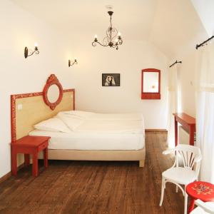 Un pat sau paturi într-o cameră la Pastel Chalet
