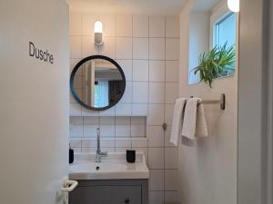 Ein Badezimmer in der Unterkunft Souterrain-Apartment in Wehlheiden Kassel