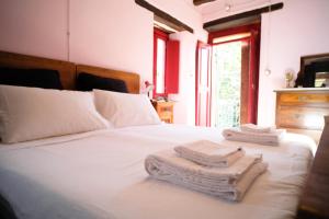 A bed or beds in a room at Il Casale del Duca - YourPlace Abruzzo