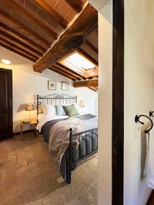 Postel nebo postele na pokoji v ubytování Bio Agriturismo Il Vigno