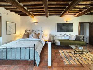 Postel nebo postele na pokoji v ubytování Bio Agriturismo Il Vigno