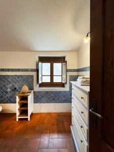 Kuchyň nebo kuchyňský kout v ubytování Bio Agriturismo Il Vigno