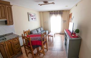 A kitchen or kitchenette at Apartamentos Rurales El Prado