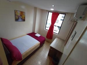 Postel nebo postele na pokoji v ubytování HOTEL Rampai Rooms