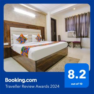 Postel nebo postele na pokoji v ubytování FabHotel Airport Avalon - Nr IGI Airport New Delhi