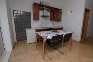 Kuchyň nebo kuchyňský kout v ubytování Apartments Simic