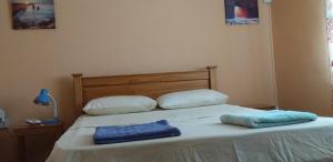 Uma cama ou camas num quarto em Flamengo