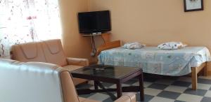 Uma cama ou camas num quarto em Flamengo