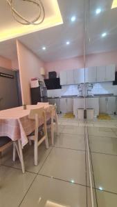 Køkken eller tekøkken på Eighty2 House Palmyra Residence