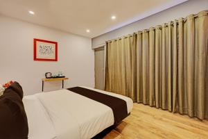 Krevet ili kreveti u jedinici u okviru objekta Hotel Belwod INN Near Delhi International Airport