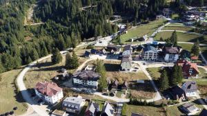 an aerial view of a house in a village at Obiteljska oaza Vlašić in Vlasic