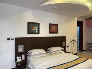 Postel nebo postele na pokoji v ubytování Hotel 5092