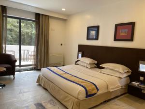 Postel nebo postele na pokoji v ubytování Hotel 5092