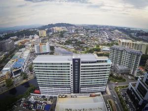 an aerial view of a large building in a city at Ber-Santai @Sky Hotel Suites in Kota Kinabalu