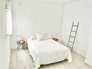 Postel nebo postele na pokoji v ubytování Elegante apartamento 6-8pax AV Palmera 3D 2B