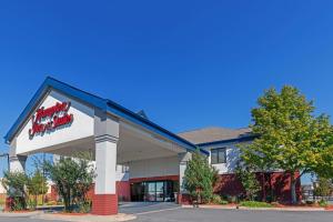 a front view of a walgreens building at Hampton Inn & Suites Tulsa-Woodland Hills in Tulsa