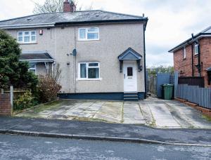 a house with a white door and a driveway at TD M-Gold Dudley Luxurious 3 Bedroom House - Sleeps 8 - Perfect for Leisure, Families, Business Long and Short Stay - Free Parking 