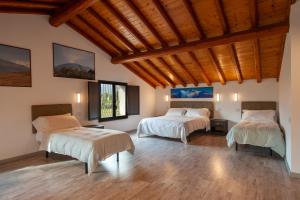 Ένα ή περισσότερα κρεβάτια σε δωμάτιο στο Agriturismo dell'Etna +36 φωτογραφίες