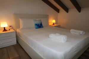 Postel nebo postele na pokoji v ubytování Blue Dream Apartments
