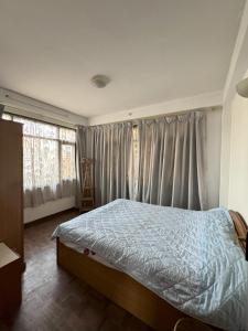 Dongol Residence客房内的一张或多张床位