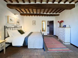 Postel nebo postele na pokoji v ubytování Bio Agriturismo Il Vigno