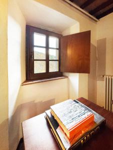 Postel nebo postele na pokoji v ubytování Bio Agriturismo Il Vigno