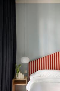Armesto Rooms客房内的一张或多张床位