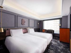Katil atau katil-katil dalam bilik di Mercure Tokyo Haneda Airport