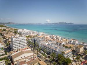 an aerial view of a city and the ocean at Can Bennasar in Can Picafort