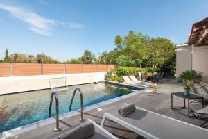 The swimming pool at or close to Ariadni Villas Faliraki
