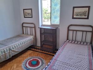 Posteľ alebo postele v izbe v ubytovaní Hostal da Glau